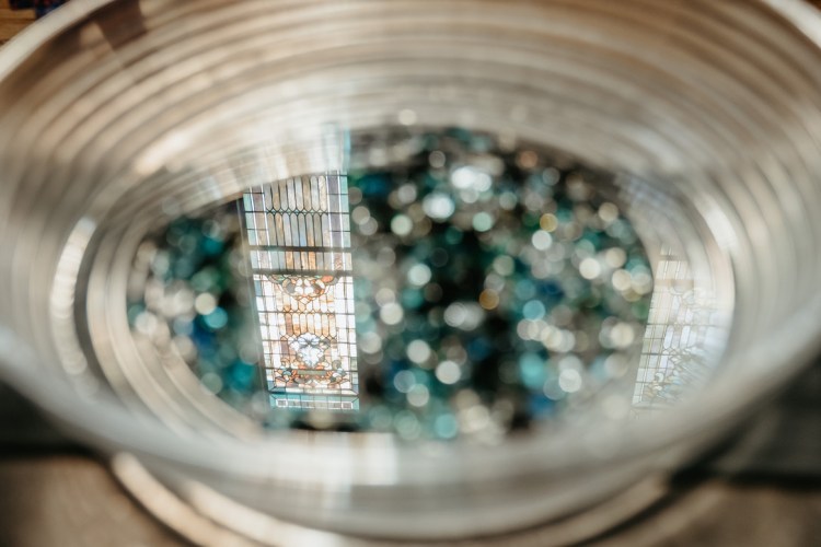 Baptismal font filled with water